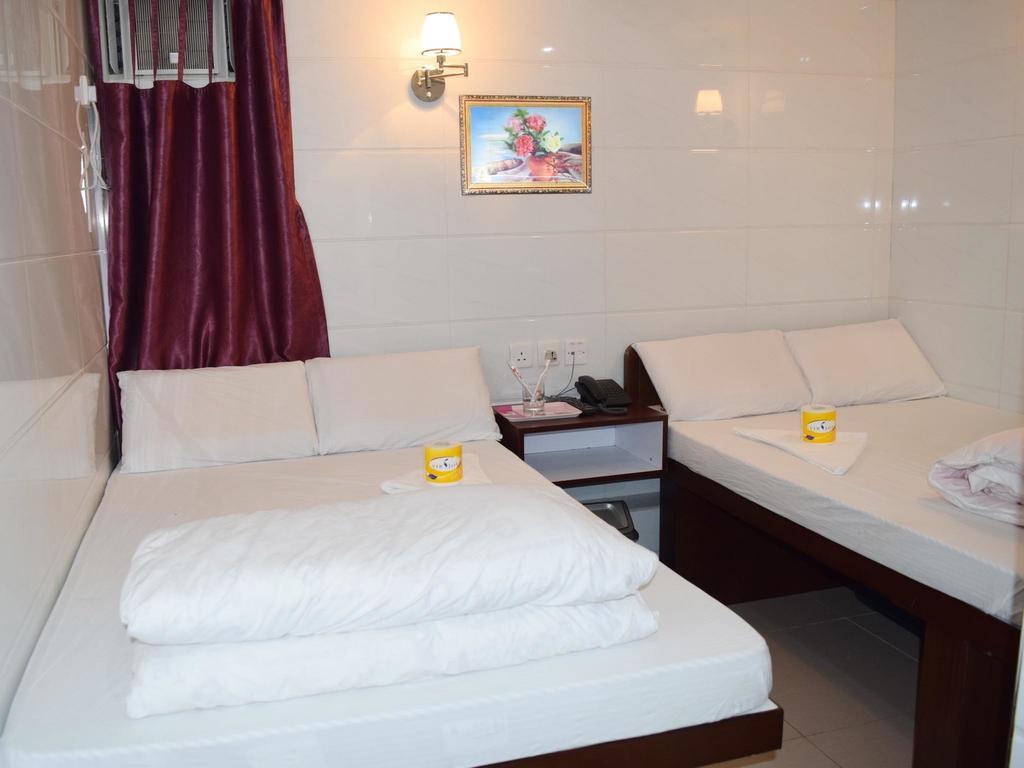 Om Guest House Гонконг Номер фото